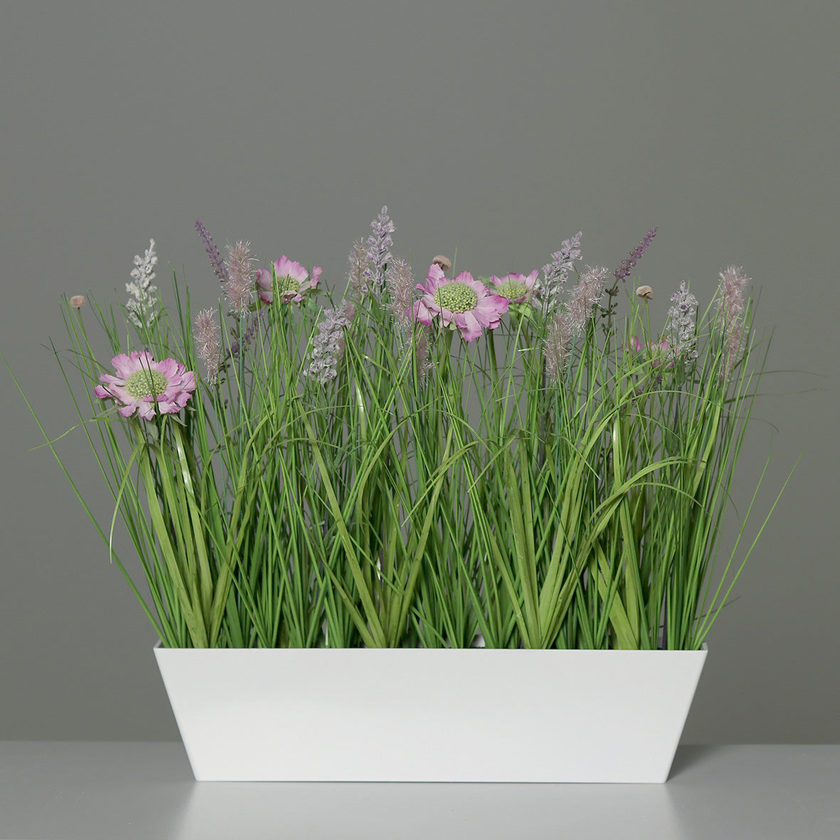 Composition artificielle fleurs de prairie - coupe plastique rectangulaire rose - H.41cm